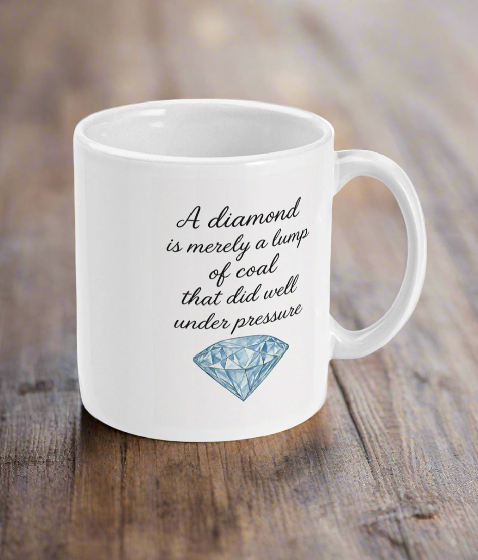 White mug with a diamond graphic and humorous quote on a white background